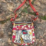 The Sak Sakroots Peace Red Circle Art Deco Cross Body Canvas Purse Photo 0