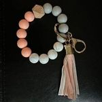 NWOT silicone key ring ring wristlet Gray and Peach Photo 0