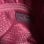 Kate Spade  Laurel Way Lilah satchel in a burgundy or mulberry color. Photo 4