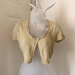 2000s Gold sparkle cropped short sleeve ruffle hem cardigan button front Photo 0