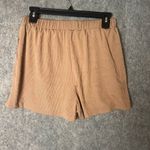 Cider  Women Size Medium Flowy pleated tan shorts‎ with pockets Photo 1