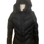 Nike black size medium down puffer jacket. Photo 0