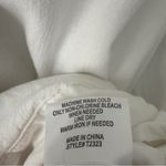 Koko + Mason White Cropped Wrap Top 3/4 sleeve snap v Photo 10