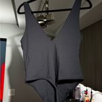 Babaton Aritzia  Contour V-Neck Bodysuit in black Photo 7