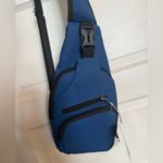 Navy Blue Sling Backpack Crossbody Bag with Multiple Zippered Compartments NWT Photo 1