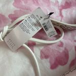 White House | Black Market  white faux leather tie tassel belt Photo 1