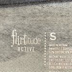 Flirtitude  Active top in a size small Photo 2