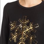 Wildfox sweatshirt
π¦π gold foil snowflake baggy beach jumper Photo 1