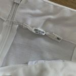 Tularosa  Straight Leg Pants With Button Detail in White Photo 2