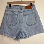 Princess Polly  Asymmetrical Denim Shorts Light Wash Cutoff Raw Hem Size 6 Photo 3