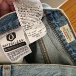 Levi's 501 High Rise Distressed Denim Cut-off Shorts in Fault Line Photo 4