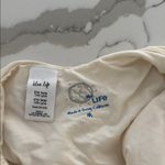 Blue Life  Cream One Piece with Red Floral Accents Photo 2