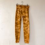 Free People  Good Karma Tie-Dye Leggings in Burnt Topaz Medium Photo 1