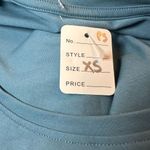 Alphalete  Women's Performance Short Sleeve Dynasty Crop Photo 8