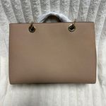 Michael Kors Pink Handbag with Floral Bow Accent Photo 1