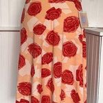 LuLaRoe New Orange Floral Shirt Photo 0