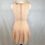 Lovposh Beautiful peach blush lace dress with see through waist and back size small Photo 3