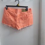 PINK Victoria's Secret denim jean cut off distress shorts in hot pink/orange size 2. Photo 4