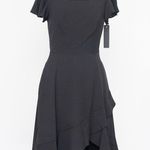 Black Halo . Tulip Hem Black Midi Dress. Photo 1