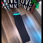 Black and Teal Yoga Pants Size M Photo 1