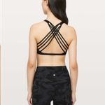Lululemon High Neck Free To Be Wild Bra in black sz 2 Photo 2