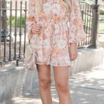 Pink Lily Long Sleeve Romper Photo 0