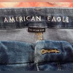 American Eagle  Ultra High-Rise Super Skinny Ripped Denim Blue Jeans Photo 4