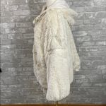 Free People Movement Take a Moment Faux Fur Hooded Jacket in ivory. Photo 2