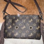 Montana West Monogram Crossbody Photo 1
