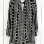 ASTR Long Sleeve Black and White Pattern V-Neck Romper Photo 0