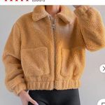 Urban Outfitters  camel colored Sherpa jacket size medium. In perfect condition! Photo 0
