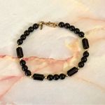 Monet black and gold tone bracelet Photo 1