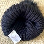 Ladies Knit Beanie in Black with Top Fluff Photo 1