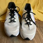 Nike  Cream and Purple Running Shoes Photo 0