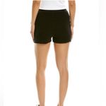 NWOT DONNI. Waffle Henley Short Button Photo 1