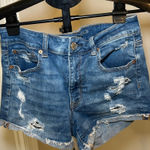 American Eagle Outfitters Ripped Blue Jean Shorts Photo 0