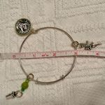 ALEX AND ANI Bracelet - Starbucks - Tinkerbell - bangle, adjustable, charms, silver tone. 2nd Starbucks on the right (Peter Pan movie reference) gently used - no flaws. Smoke free home. Photo 7