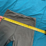 Athleta ultimate stash pocket embossed 7/8 tight M Photo 2