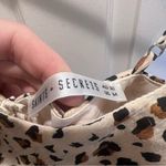 Saints + Secrets leopard cheetah draped ruffle tie back sleeveless romper Photo 2