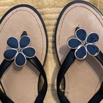 Size 7 Black and Tan comfy sandals with cute flower details GUC Photo 4