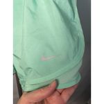 Nike  Dri FIT Running Shorts‎ Women's Medium Mint Green Athletic Gym Workout Photo 1