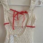 Urban Outfitters  Kimchi Blue Penelope Lace Keyhole Back Asymmetric Top Photo 6