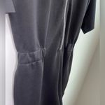 Ostaug Romper Woman’s size M Black Short Sleeve Zip Photo 5