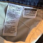 Levi's Levi’s denim mini skirt in blue medium wash jean distressed size 30 Photo 7