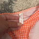 never worn orange bathing suit bottoms Photo 1