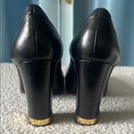Tory Burch Black and Gold Chunky Heel Pumps with Gold Ornament Photo 3