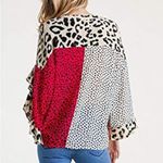 Umgee 🏷️🏷️ small juniors/ladies sheer top cougar print Photo 1