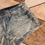 American Eagle  acid light wash studded denim booty shorts size 4 Photo 1