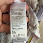 Anthropologie Nia Floral W/White Embroidered
Ladder Lace Trim Floral Tunic Top M Photo 13