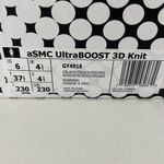 Adidas by Stella McCartney Ultraboost 3D Knit Sneaker in Black & Signal Orange Photo 10